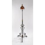 W.A.S. Benson style floor standing oil lamp, the copper reservoir above a steel stand with