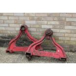 Cornish & Lloyds of Bury St Edmunds farm machinery rib roller ends, painted in red (2)