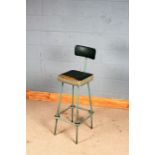 Mid 20th century industrial machinists chair, with tubular metal legs and square foot rest, 106cm
