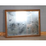 Large 20th Century pine framed wall mirror, with a bevelled glass plate, 134cm x 104cm