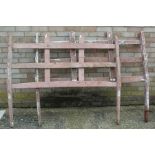 Pair of hay cart side panels, each with three horizontal planks, 156cm wide, 123cm high (2)