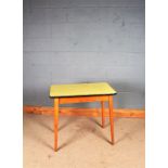 Mid 20th Century side table, the rectangular formica top above four tapering legs, 46cm deep, 80.5cm