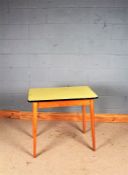 Mid 20th Century side table, the rectangular formica top above four tapering legs, 46cm deep, 80.5cm