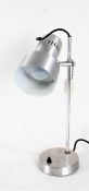 20th Century chrome adjustable desk lamp, the circular base with on/off button, 38cm high