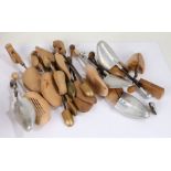 Collection of shoe trees of various sizes some are wooden other are metal (Qty)
