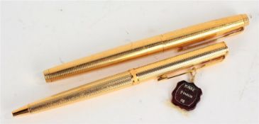 Parker gold plated ballpoint pen, and a Parker 14 carat gold filled fountain pen (2)