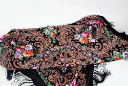 Piano shawl, with brightly coloured flowers on a black ground