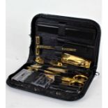 Pierre Cardin, leather cased travelling vanity set, comprising razor, comb, scissors, nail file