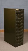 Remington Rand industrial metal cabinet, in green, fitted with eleven drawer, 36.5cm wide, 130cm