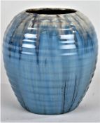 1930's Candy Ware vase, of ribbed form with blue running glaze, 15cm high