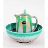 Shelley fruit bowl, with green and brown running glaze, together with a similar pot (2)