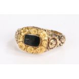 George III mourning ring, the black enamel head with a flower head shank, the internal inscription