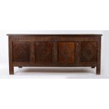 Charles II oak coffer, circa1660, the five panel rectangular top enclosing a candle box and