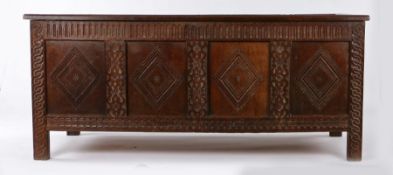 Charles II oak coffer, circa1660, the five panel rectangular top enclosing a candle box and