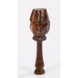 18th Century English yew wood grotesque face nutcracker, the face of a bearded man wearing a fez,