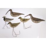Five primitive Folk art bird decoys, early 20th Century, each painted and raised on metal stands,