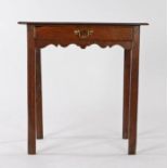 George III oak side table, the rectangular top above a single frieze drawer with carved pediment,