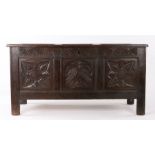 Mid 17th Century oak coffer, West Country, circa 1650, the rectangular three panel top above a