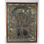 Stained glass panel, probably 16th Century elements, depicting a figure bringing the ciborium to a