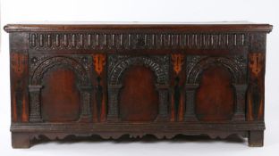 An Elizabeth I oak and inlaid coffer, Yorkshire, circa 1600, of large proportions, the rectangular