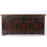 An Elizabeth I oak and inlaid coffer, Yorkshire, circa 1600, of large proportions, the rectangular