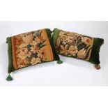 Two cushions of Aubusson tapestry, of floral design set within green cotton velvet, 43cm x 39cm