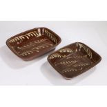 Two pottery slipware baking dishes, both of rectangular form and high sides decorated with wriggle