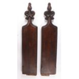 Pair 19th Century carved pine pew ends, the poppy head finials above rectangular pew sides, 129cm