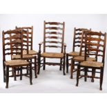 19th Century Harlequin set of seven Lancashire oak and ash ladderback chairs, with rush seats,