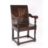 Charles I oak double panel-back open armchair, English or Welsh, circa 1640, the back with two