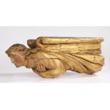 Charles II late 17th Century pine East Anglian hammer beam roof angel, the gilded body with a finely