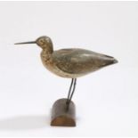 Early 20th Century Shorebird decoy, with a painted body and coloured bead eyes and a metal pointed
