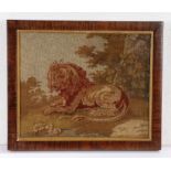 Victorian woolwork panel, of a reclining lion among tress, 28cm x 23cm