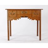 George III oak lowboy, the rectangular top above three drawers and a shaped apron on the square