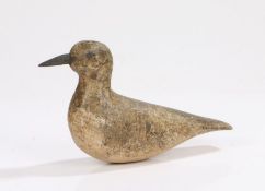 Early 20th Century decoy bird, with a painted body and nails for eyes termination with a stumpy