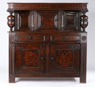 A good small Charles I oak and inlaid canted court cupboard, Yorkshire Leeds – Halifax, circa 1630 –