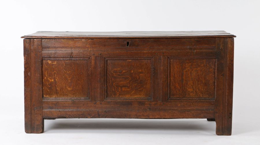 Charles I oak coffer, circa 1640, the rectangular hinged top above three panels to the front, with