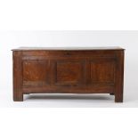 Charles I oak coffer, circa 1640, the rectangular hinged top above three panels to the front, with