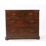 George II oak chest of drawers, circa 1740, the rectangular top above two short and two long drawers
