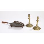 Pair of 18th Century brass candlesticks, with tapering stems and a stepped foot,17.5cm high,