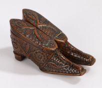 Rare dated 19th Century treen dual shoe snuff, the pair of shoes with a pique work and carved