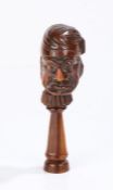 18th Century English yew wood grotesque face nutcracker, the face of a grumpy man with night cap,