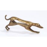 Novelty brass nutcracker, in the form of a greyhound with a hinged body, the inside of the body with