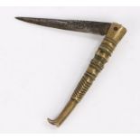 Early 19th Century Spanish folding knife, the brass grip in the form of a long leg and boot to the