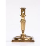 Spanish late 17th Century candlestick, the baluster stem above a ring and square foot, 17cm high