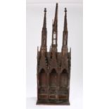 A good 19th Century mahogany model, of a church section with three spires above three arches