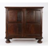 Charles II oak enclosed chest of drawers, circa 1680, the boarded top with applied moulded edge,