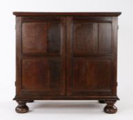 Charles II oak enclosed chest of drawers, circa 1680, the boarded top with applied moulded edge,