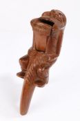 Unusual late 19th Century nutcracker, of large proportions, the figure holding onto the lever, his
