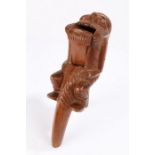 Unusual late 19th Century nutcracker, of large proportions, the figure holding onto the lever, his